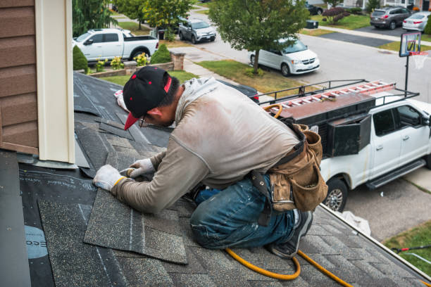 Professional Roofing technician working in Moonachie, NJ